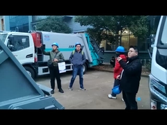 Klanten bezoeken de fabriek om de gecomprimeerde vuilniswagen te testen